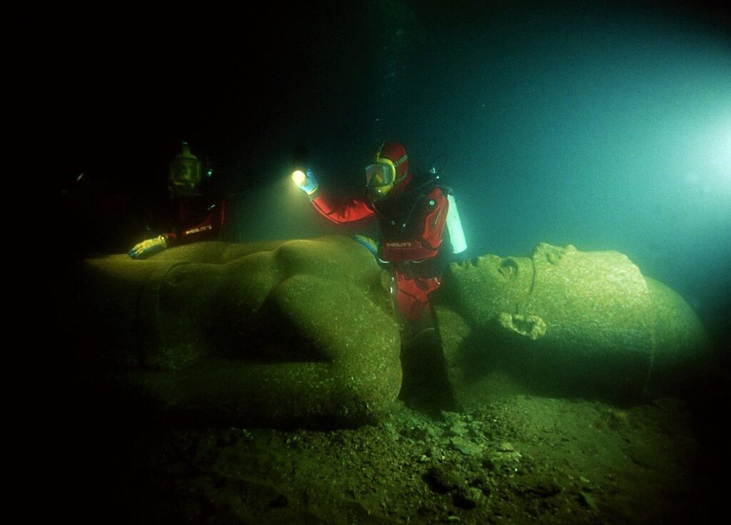 Heracleion, City of Heracleion Alexandria, Ancient Alexandria, Sunken City, Submerged City, Underwater Archaeology, Franck Goddio, Ancient Egyptian Port, Nile Delta, Historical Significance, Archaeological Discovery, Temple of Amun-Gereb, Granite Statues, Trade Routes, Ptolemaic Dynasty, Cleopatra, Greek Influence, Cultural Exchange, Lost City Rediscovery, Maritime Archaeology, Historical Mysteries, Archaeological Expedition, Ancient Maritime Trade, Submerged Ruins, Religious Practices in Ancient Egypt, Ancient Egyptian Artifacts, Cultural Heritage Preservation, Tourist Attraction in Egypt, Scientific Research on Heracleion,