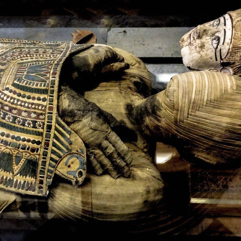Patcheri mummy,
Egyptian mummification techniques,
Ancient burial practices,
Ptolemaic era artifacts,
Mysteries of the afterlife,
Preservation of ancient remains,
Intricate embalming rituals,
Archaeological discoveries,
Historical enigmas,
Cultural heritage treasures,