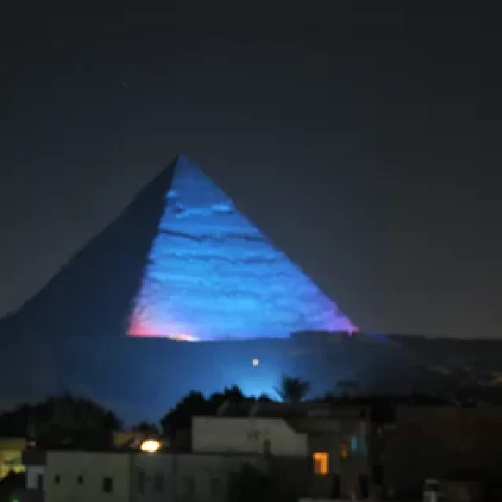 Nighttime pyramids,
Pyramids after dark,
Egyptian pyramids illumination,
Nocturnal pyramid photography,
Stargazing at Giza,
Night tours of ancient sites,
Egypt sound and light shows,
Moonlight Karnak Temple
