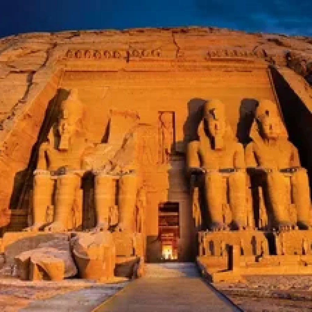 Abu Simbel temples, Nubian Monuments, Ramses II Sanctuary, Aswan High Dam Relocation, Sun Festival Phenomenon, Pharaoh's Divine Statues, Nefertari's Tribute, Egyptian Architectural Wonders, Colossal Sculptures, UNESCO Heritage Site, Nubian Relocation Project