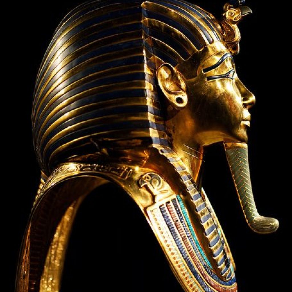 The Golden Mask of Tutankhamun,
Ancient Egyptian Artifact,
Howard Carter Discovery,
Pharaoh's Burial Mask,
18th Dynasty Egypt,
Tutankhamen's Tomb,
Valley of the Kings,
Egyptian Antiquities,
Semi-Precious Inlays,
Historical Relic,
Egyptology Milestone
