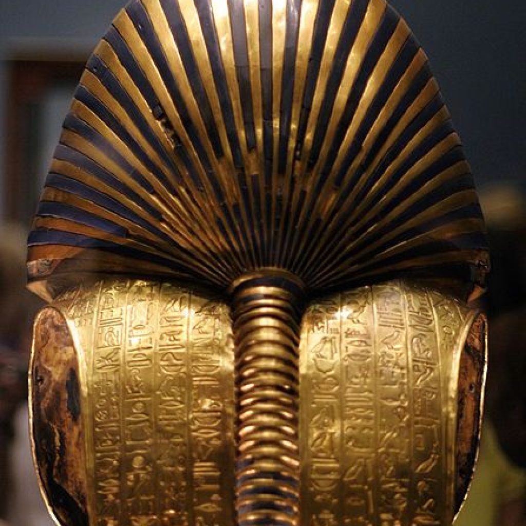 The Golden Mask of Tutankhamun,
Ancient Egyptian Artifact,
Howard Carter Discovery,
Pharaoh's Burial Mask,
18th Dynasty Egypt,
Tutankhamen's Tomb,
Valley of the Kings,
Egyptian Antiquities,
Semi-Precious Inlays,
Historical Relic,
Egyptology Milestone
