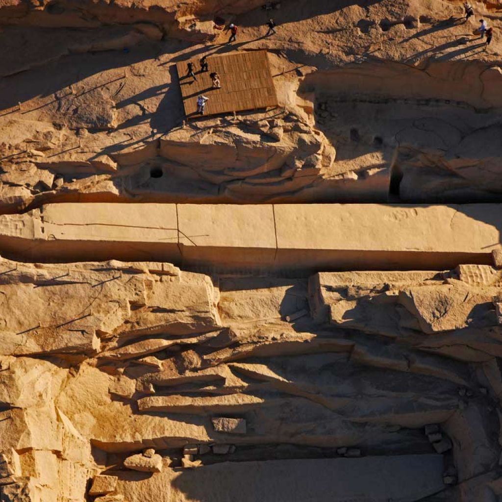 The Unfinished Obelisk, Aswan,
Aswan Granite Quarry,
Hatshepsut’s Monument,
Ancient Egyptian Engineering,
Granite Carving Techniques,
Obelisk Crack Mystery,
New Kingdom Architecture,
Dolerite Ball Tools,
Archaeological Discoveries,
Egyptian Sun God Ra,
Monumental Abandonment