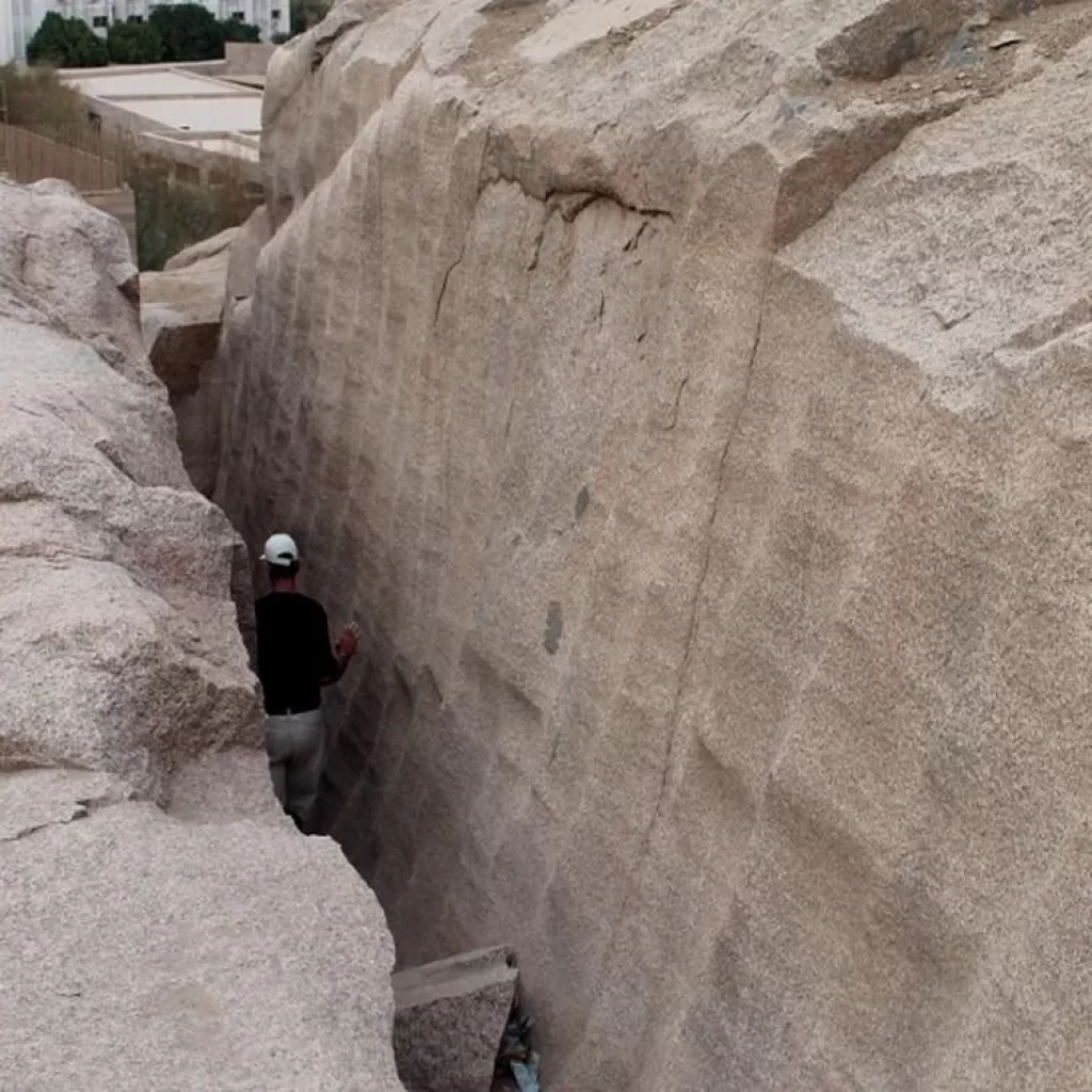 The Unfinished Obelisk, Aswan,
Aswan Granite Quarry,
Hatshepsut’s Monument,
Ancient Egyptian Engineering,
Granite Carving Techniques,
Obelisk Crack Mystery,
New Kingdom Architecture,
Dolerite Ball Tools,
Archaeological Discoveries,
Egyptian Sun God Ra,
Monumental Abandonment