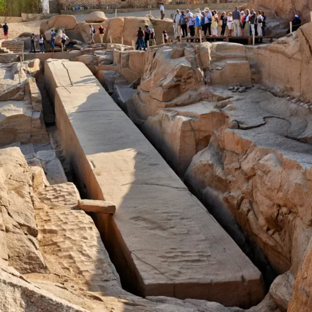 The Unfinished Obelisk, Aswan,
Aswan Granite Quarry,
Hatshepsut’s Monument,
Ancient Egyptian Engineering,
Granite Carving Techniques,
Obelisk Crack Mystery,
New Kingdom Architecture,
Dolerite Ball Tools,
Archaeological Discoveries,
Egyptian Sun God Ra,
Monumental Abandonment