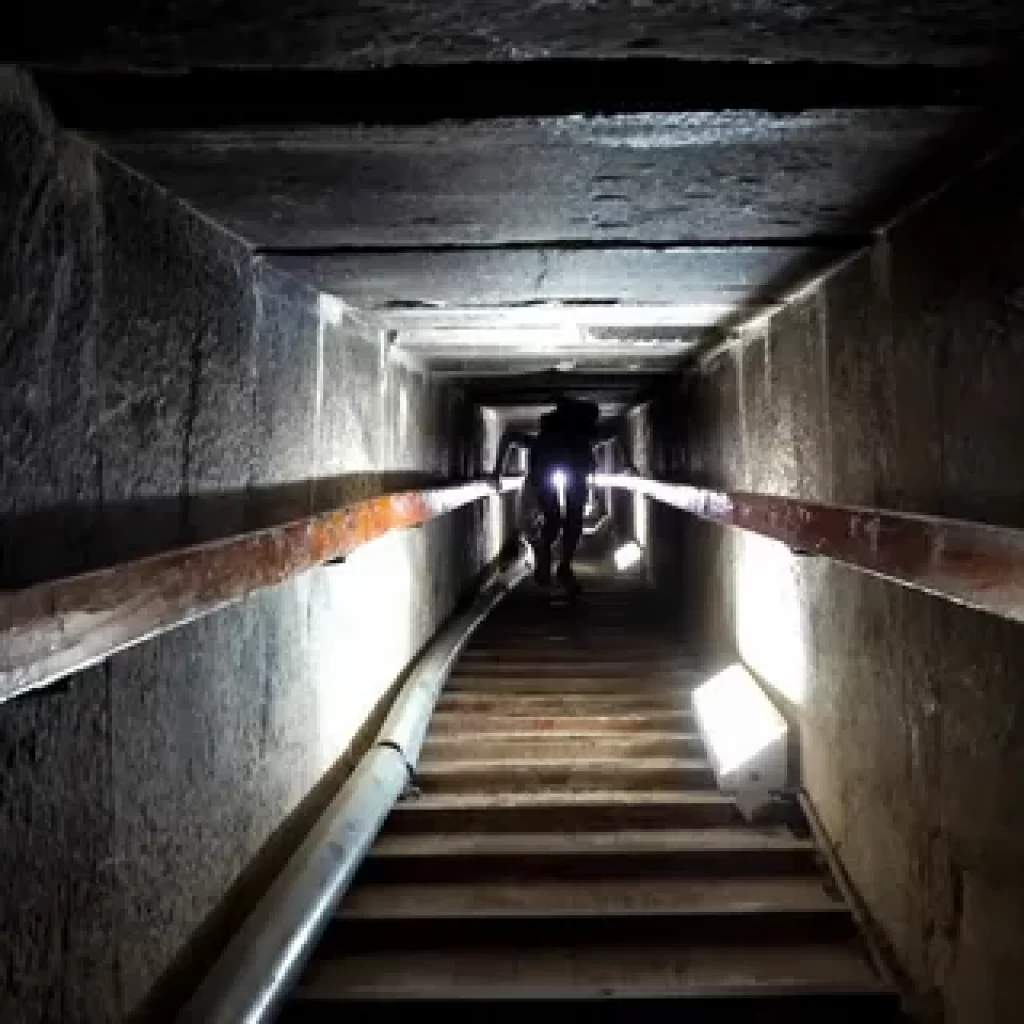 inside the giza pyramids,
Giza Necropolis,
Pharaoh's chambers,
Ancient Egyptian burial rites,
Pyramid corridors,
Sphinx guardianship