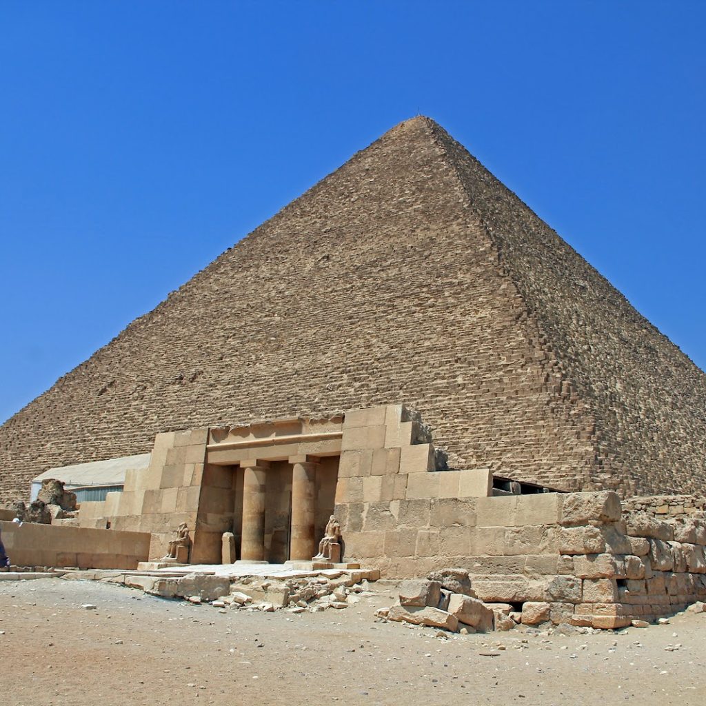 Egyptian pyramids at Giza,
Giza Plateau,
Ancient Egyptian architecture,
Khufu Pyramid,
Fourth Dynasty tombs,
Pyramid alignment,
Limestone monoliths,
Pharaohs' legacy,
Giza necropolis,
Pyramid mysteries,
Sphinx guardian