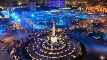 Cairo Tahrir Square, Historic Cairo Plaza, Egyptian Revolution hub, Tahrir landmarks, Freedom Square Cairo, Tahrir cultural center, Cairo’s political heart, Tahrir protest site, Cairo Tahrir monuments, Egyptian civic space, Tahrir Square evolution