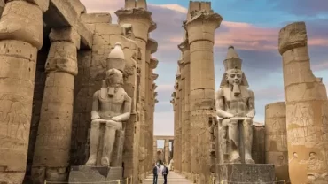 luxor temple, Theban Triad, Avenue of Sphinxes, Opet Festival, Hypostyle Hall, Pharaoh Amenhotep III, Karnak Connection, Sacred Nile Bank, New Kingdom Era, Divine Kingship, Rameses II Obelisk